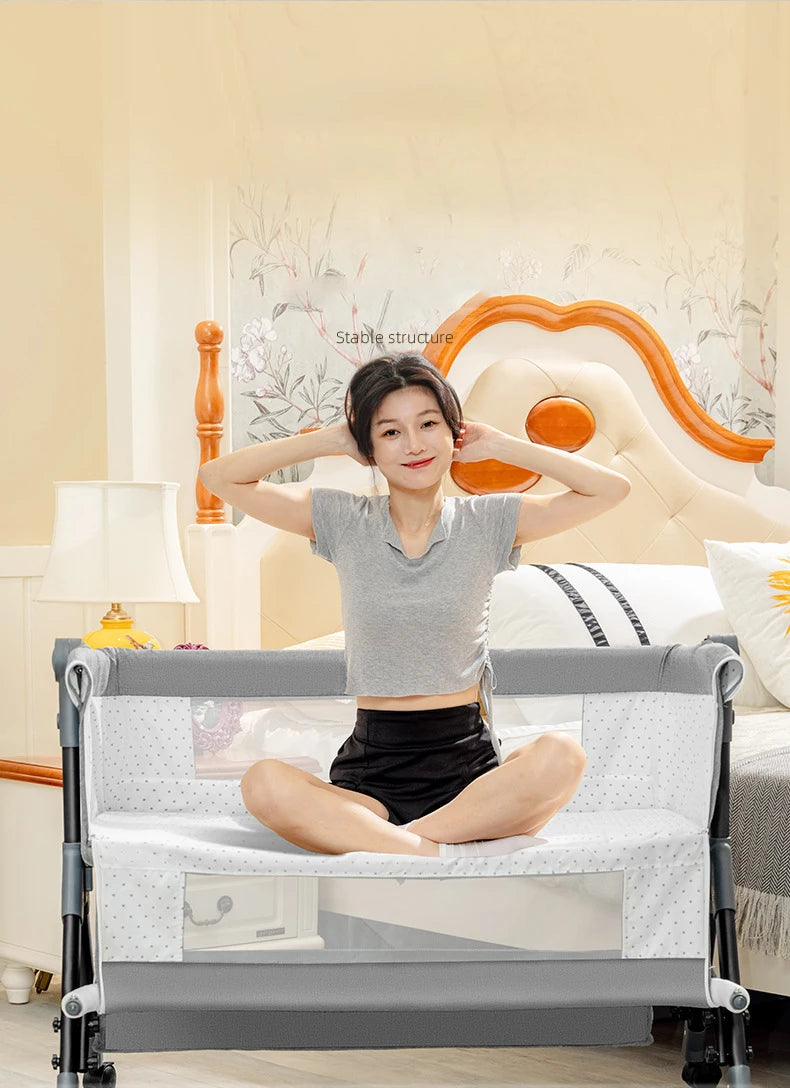 SnugNest™ Foldable Baby Crib Portable Bassinet with Changing Table, Storage & Mosquito Net